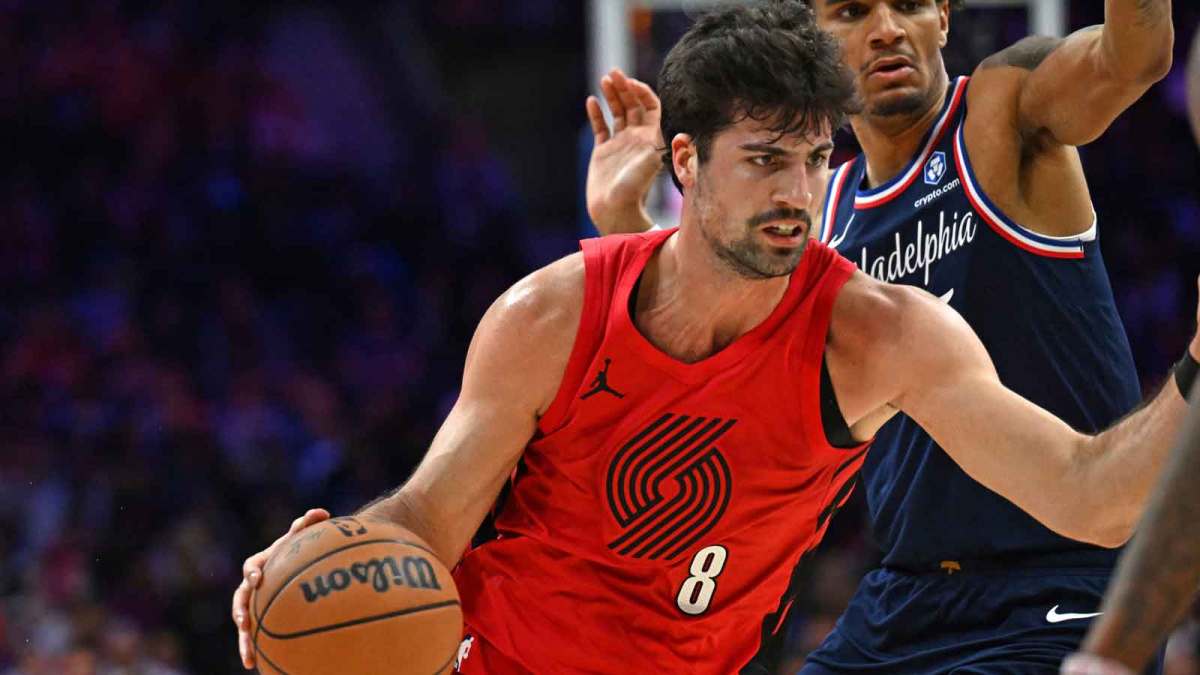 Portland Trail Blazers forward Deni Avdija (8) drives to the basket past Philadelphia 76ers forward Dominick Barlow (25) during the first half at Xfinity Mobile Arena.