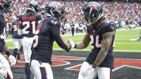 Houston Texans safety Jalen Pitre (5) celebrates with cornerback Derek Stingley Jr. (24) after making an interception during the second quarter against the Indianapolis Colts at NRG Stadium.