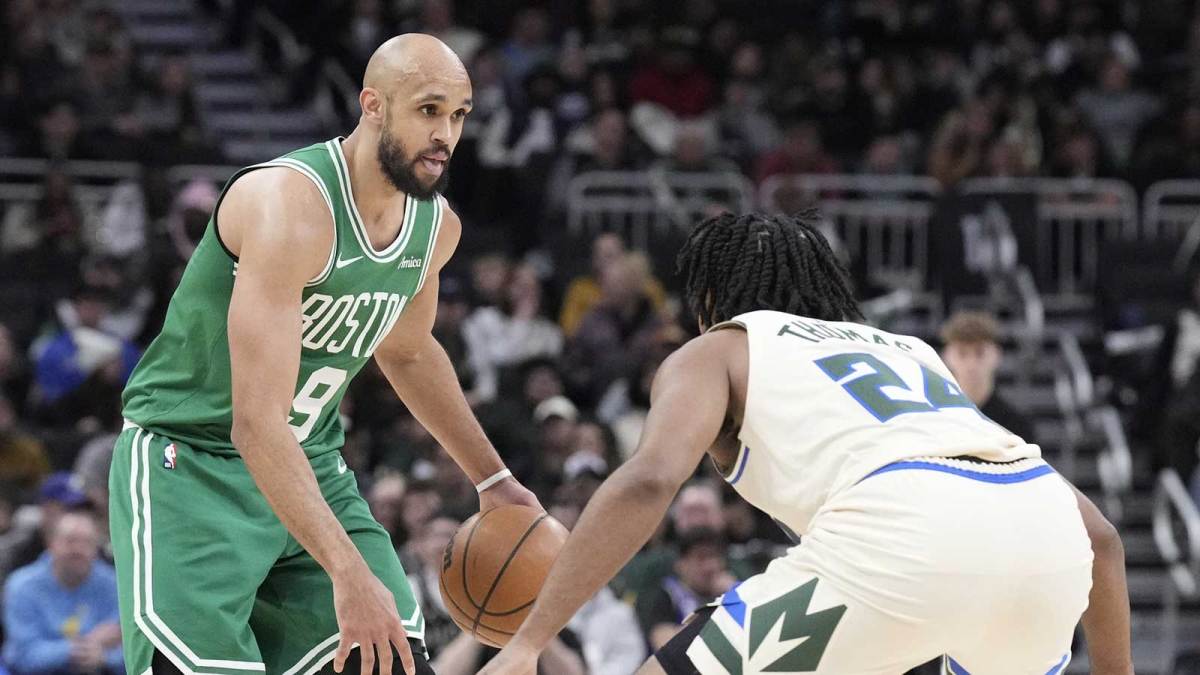 Boston Celtics guard Derrick White (9) brings the ball up the court against Milwaukee Bucks guard Cam Thomas (24) in the second half at Fiserv Forum.