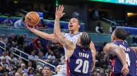 Orlando Magic guard Desmond Bane (3) goes to the basket against Cleveland Cavaliers guard Jaylon Tyson (20) during the second quarter at Kia Center.