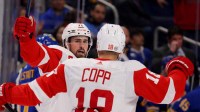 Detroit Red Wings center Dylan Larkin (71) celebrates his goal with center Andrew Copp (18) during the third period against the Buffalo Sabres at KeyBank Center.
