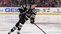 New Jersey Devils center Jack Hughes (86) skates with the puck against the Los Angeles Kings during the second period at Prudential Center.