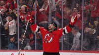 New Jersey Devils left wing Paul Cotter (47) celebrates his game winning goal against the Boston Bruins during overtime at Prudential Center.