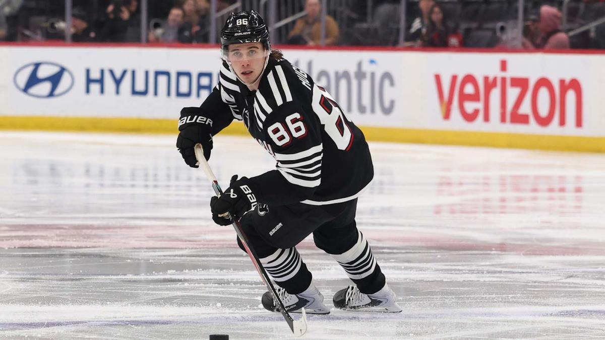 New Jersey Devils center Jack Hughes (86) skates with the puck against the Los Angeles Kings during the second period at Prudential Center.