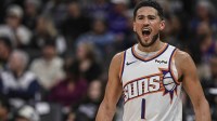 Phoenix Suns guard Devin Booker (1) reacts during the third quarter against the Sacramento Kings at Golden 1 Center