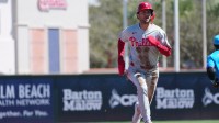 Philadelphia Phillies shortstop Trea Turner (7) advances to third base on a sacrifice fly in the first inning against the Miami Marlins at Roger Dean Chevrolet Stadium.