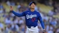 Los Angeles Dodgers two-way player Shohei Ohtani (17) reacts after throwing an inside pitch to Los Angeles Angels center fielder Jo Adell (7) in the fourth at Dodger Stadium.
