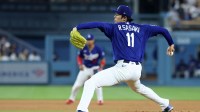 Los Angeles Dodgers pitcher Roki Sasaki (11) pitches during the fourth inning against the Los Angeles Angels at Dodger Stadium.