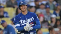 Los Angeles Dodgers two-way player Shohei Ohtani (17) on deck in the fourth against the Los Angeles Angels at Dodger Stadium.