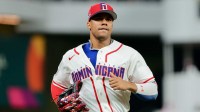 Dominican Republic right fielder Juan Soto (22) returns to the dugout during the fifth inning against the United States during a semifinal game of the 2026 World Baseball Classic at loanDepot Park.