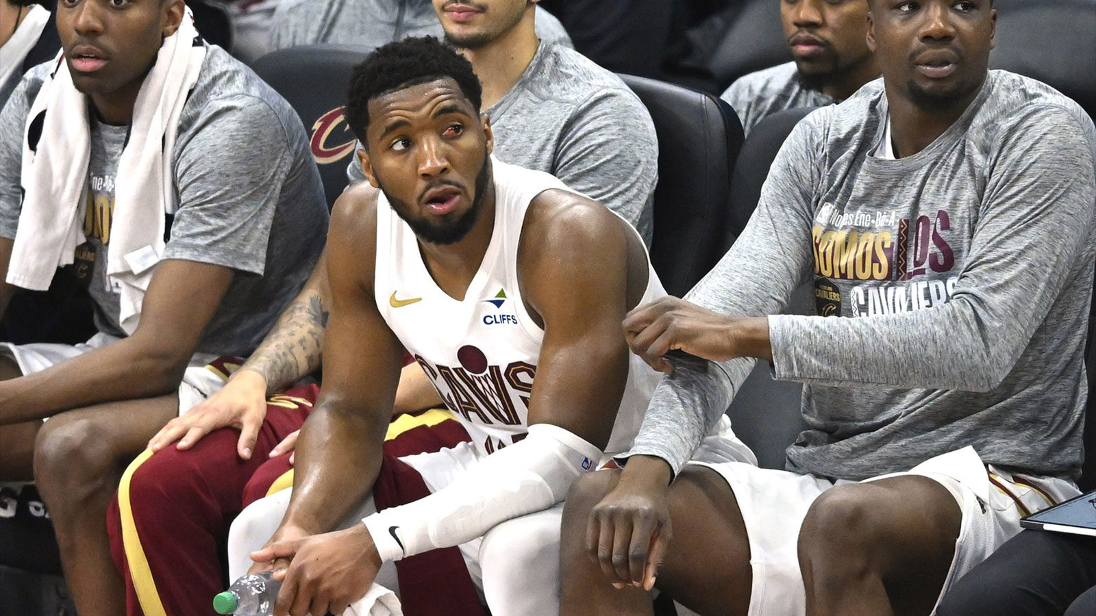 Cleveland Cavaliers guard Donovan Mitchell (center) sits on the bench after fouling out in the fourth quarter against the Miami Heat at Rocket Arena. 