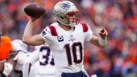 New England Patriots quarterback Drake Maye (10) drops back to pass against the Denver Broncos during the first half in the 2026 AFC Championship Game at Empower Field at Mile High.