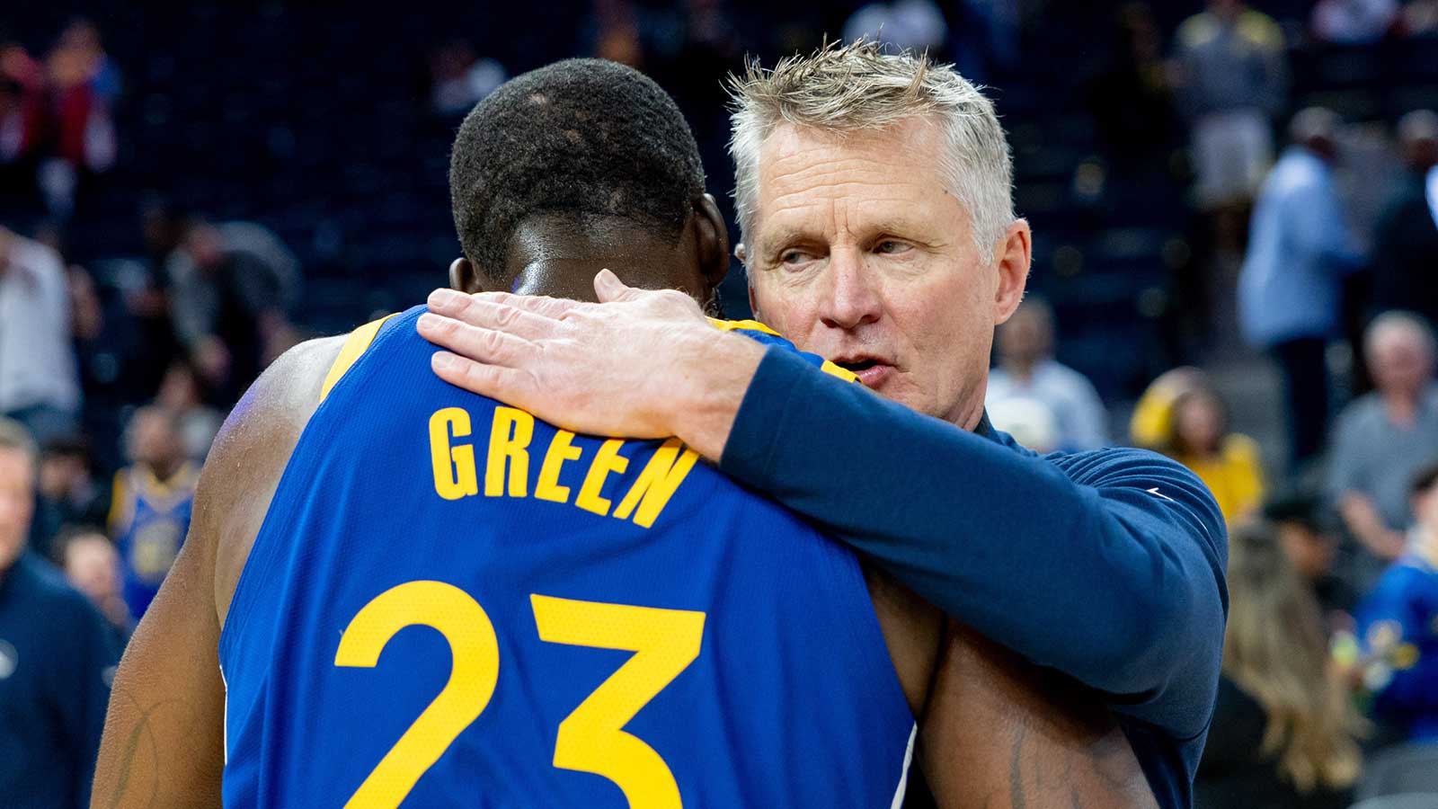 Golden State Warriors head coach Steve Kerr and Golden State Warriors forward Draymond Green (23) embrace after the game against the Chicago Bulls at Chase Center.