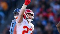 Kansas City Chiefs linebacker Drue Tranquill (23) holds up a fist after stoppingg Tennessee Titans on forth down during the second half at Nissan Stadium. Mandatory Credit: Steve Roberts-Imagn Images