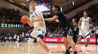 Villanova Wildcats forward Duke Brennan (24) controls the ball against Xavier Musketeers forward Jovan Milicevic (24) in the first half at William B. Finneran Pavilion.
