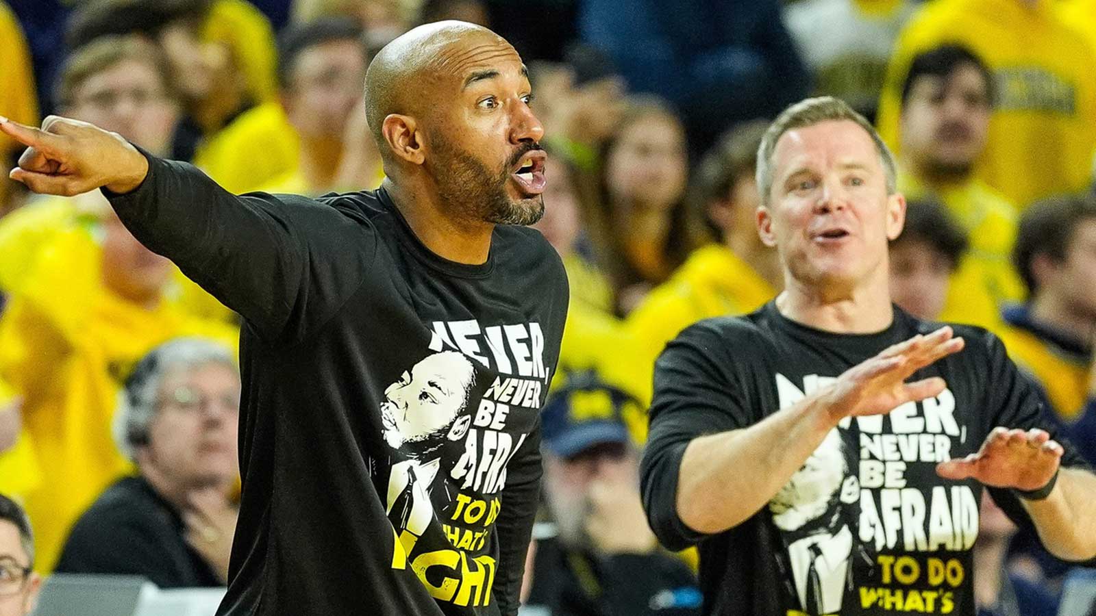 Michigan assistant coach Justin Joyner and head coach Dusty May signal players during a play against Northwestern in the overtime at Crisler Center in Ann Arbor on Sunday, Jan. 19, 2025.