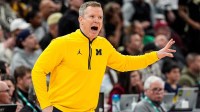 Michigan head coach Dusty May reacts to a play against Purdue during the first half of Big Ten Tournament final at United Center in Chicago on Sunday, March 15, 2026.