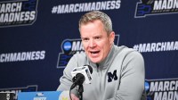 Michigan Wolverines head coach Dusty May speaks to the media after a first round game of the men's 2026 NCAA Tournament against the Howard Bison at Keybank Center.