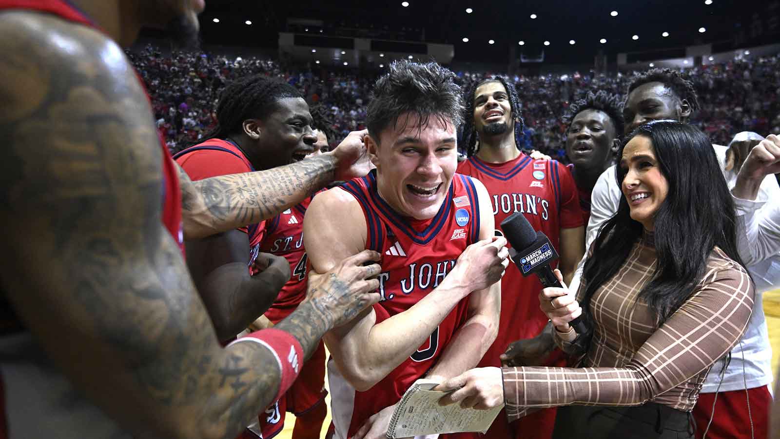 St. John's Red Storm guard Dylan Darling (0) celebrates after defeating the Kansas Jayhawks in a second round game of the men's 2026 NCAA Tournament at Viejas Arena. Mandatory Credit: Denis Poroy-Imagn Images