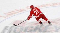 Detroit Red Wings center Dylan Larkin (71) skates with the puck in the first period against the Vegas Golden Knights at Little Caesars Arena.