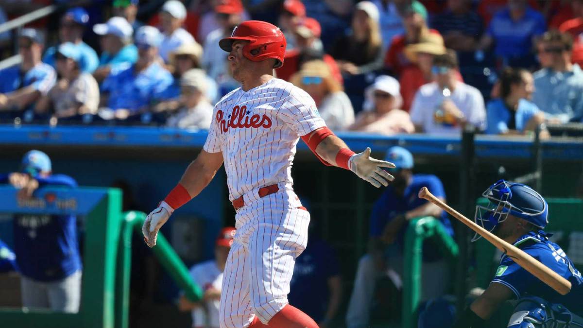 Philadelphia Phillies first baseman Dylan Moore (25) singles during the sixth inning against the Toronto Blue Jays at BayCare Ballpark.