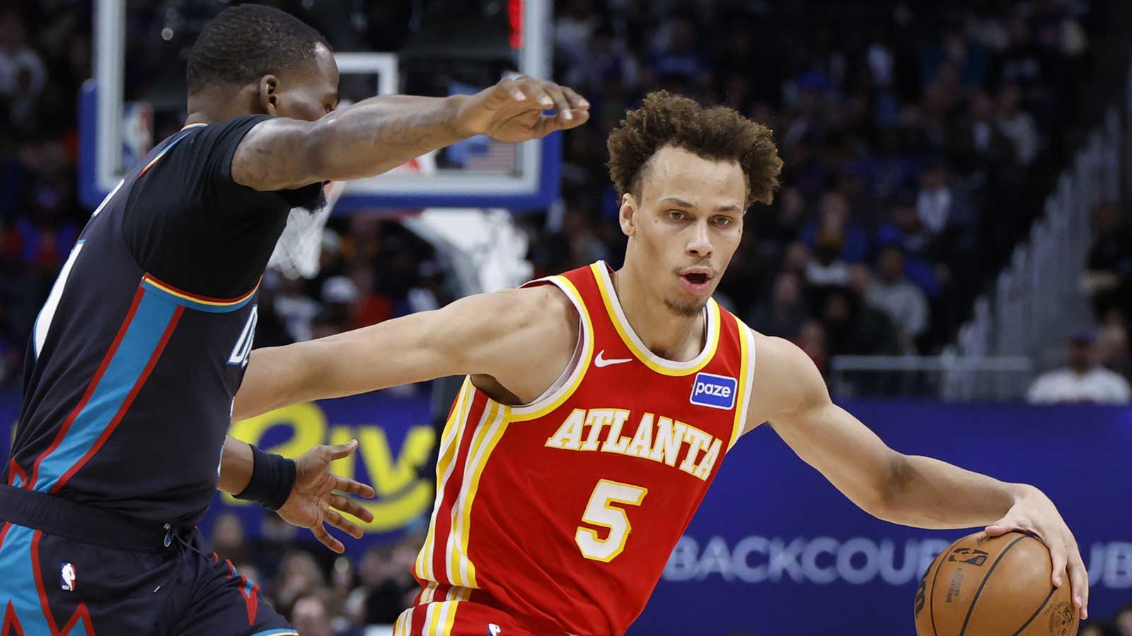 Atlanta Hawks guard Dyson Daniels (5) dribbles in the second half against the Detroit Pistons at Little Caesars Arena.