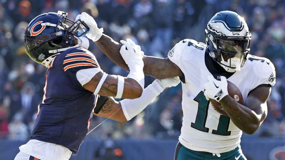 Philadelphia Eagles wide receiver A.J. Brown (11) runs the ball after a catch on Chicago Bears safety Jaquan Brisker (9) during the second quarter at Soldier Field.