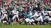 Philadelphia Eagles quarterback Jalen Hurts (1) plays the tush push for a first down against the Las Vegas Raiders during the first quarter at Lincoln Financial Field.