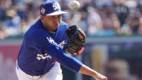 Los Angeles Dodgers pitcher Edwin Diaz (3) on the mound to pitch in the third inning of a spring training game against the Chicago Cub at Camelback Ranch-Glendale.