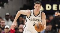 Brooklyn Nets guard Egor Demin (8) dribbles against the Atlanta Hawks during the first half at State Farm Arena.