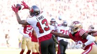 Tampa Bay Buccaneers wide receiver Mike Evans (13) catches a touchdown pass against San Francisco 49ers cornerback Ambry Thomas (right) during the second quarter at Levi's Stadium.