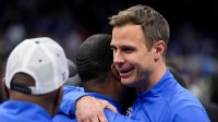 Duke Blue Devils head coach Jon Scheyer celebrates after defeating the Virginia Cavaliers in the men's ACC Conference Tournament Championship at Spectrum Center.