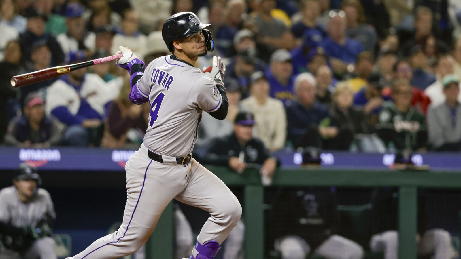 Colorado Rockies shortstop Ezequiel Tovar (14) hits an RBI-single against the Seattle Mariners during the sixth inning at T-Mobile Park