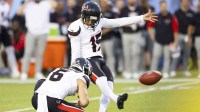 Houston Texans kicker Ka’imi Fairbairn (15) kicks the point after try on a hold by punter Tommy Townsend (6) during the first quarter against the Chicago Bears at Tom Benson Hall of Fame Stadium.
