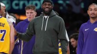 Los Angeles Lakers forward LeBron James watches from the bench against the Indiana Pacers at Crypto.com Arena.