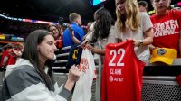 Indiana Fever guard Caitlin Clark (22) signs autographs Friday, Sept. 26, 2025, ahead of Game 3 of the WNBA semifinals against the Las Vegas Aces at Gainbridge Fieldhouse in Indianapolis.