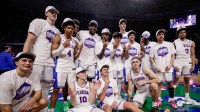 Florida Gators players pose for a team photo while celebrating the SEC regular season championship following the game against the Arkansas Razorbacks at Exactech Arena at the Stephen C. O'Connell Center.