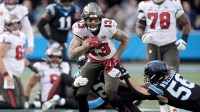 Tampa Bay Buccaneers wide receiver Mike Evans (13) runs against Carolina Panthers linebacker Christian Rozeboom (56) during the second half at Bank of America Stadium.