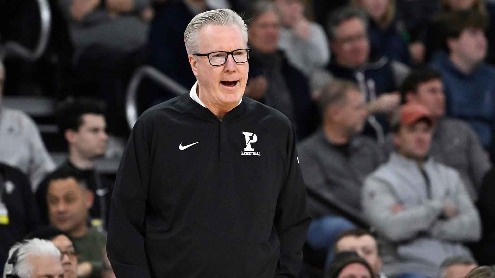 Penn Quakers head coach Fran McCaffery reacts to game action during the first half against the Providence Friars at Amica Mutual Pavilion.