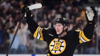 Boston Bruins center Fraser Minten (93) reacts after defeating the Los Angeles Kings in overtime at TD Garden.
