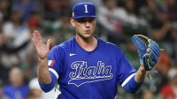Italy pitcher Gabriele Quattrini (80) celebrates the win against Mexico at Daikin Park.