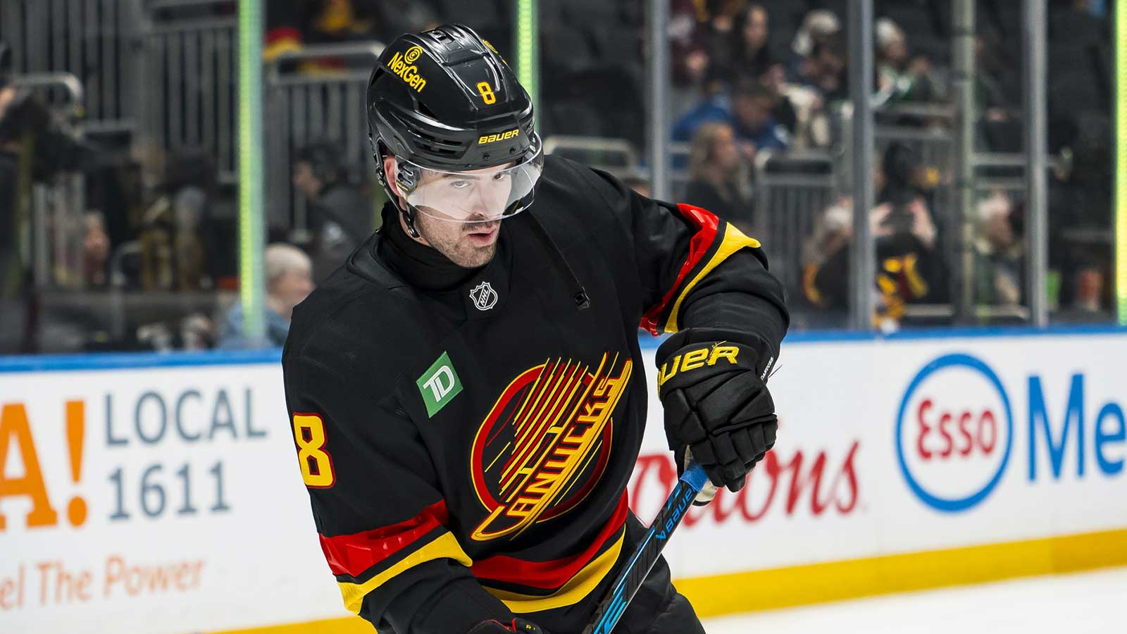 Vancouver Canucks forward Conor Garland (8) handles the puck in warm up prior to a game against the Dallas Stars at Rogers Arena. 