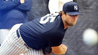 New York Yankees pitcher Gerrit Cole (45) throws a bullpen session during spring training practices at George M. Steinbrenner Field.