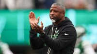 New York Jets head coach Aaron Glenn on the field prior to the game against the New England Patriots at MetLife Stadium.