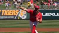 Los Angeles Angels pitcher Grayson Rodriguez (21) throws against the Cleveland Guardians in the first inning at Tempe Diablo Stadium.