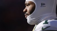Green Bay Packers defensive end Micah Parsons (1) warms up before a game against the Denver Broncos at Empower Field at Mile High.
