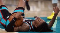 Memphis Grizzlies guard Ja Morant (12) lays on the court during the third quarter against the Oklahoma City Thunder at FedExForum.