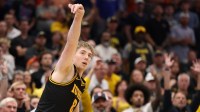 Iowa Hawkeyes forward Cooper Koch (8) holds his follow through on a shot against the Florida Gators in the second half during a second round game of the men's 2026 NCAA Tournament at Benchmark International Arena.