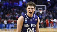 High Point Panthers guard Chase Johnston (99) reacts after defeating the Wisconsin Badgers in a first round game of the men's 2026 NCAA Tournament at Moda Center.