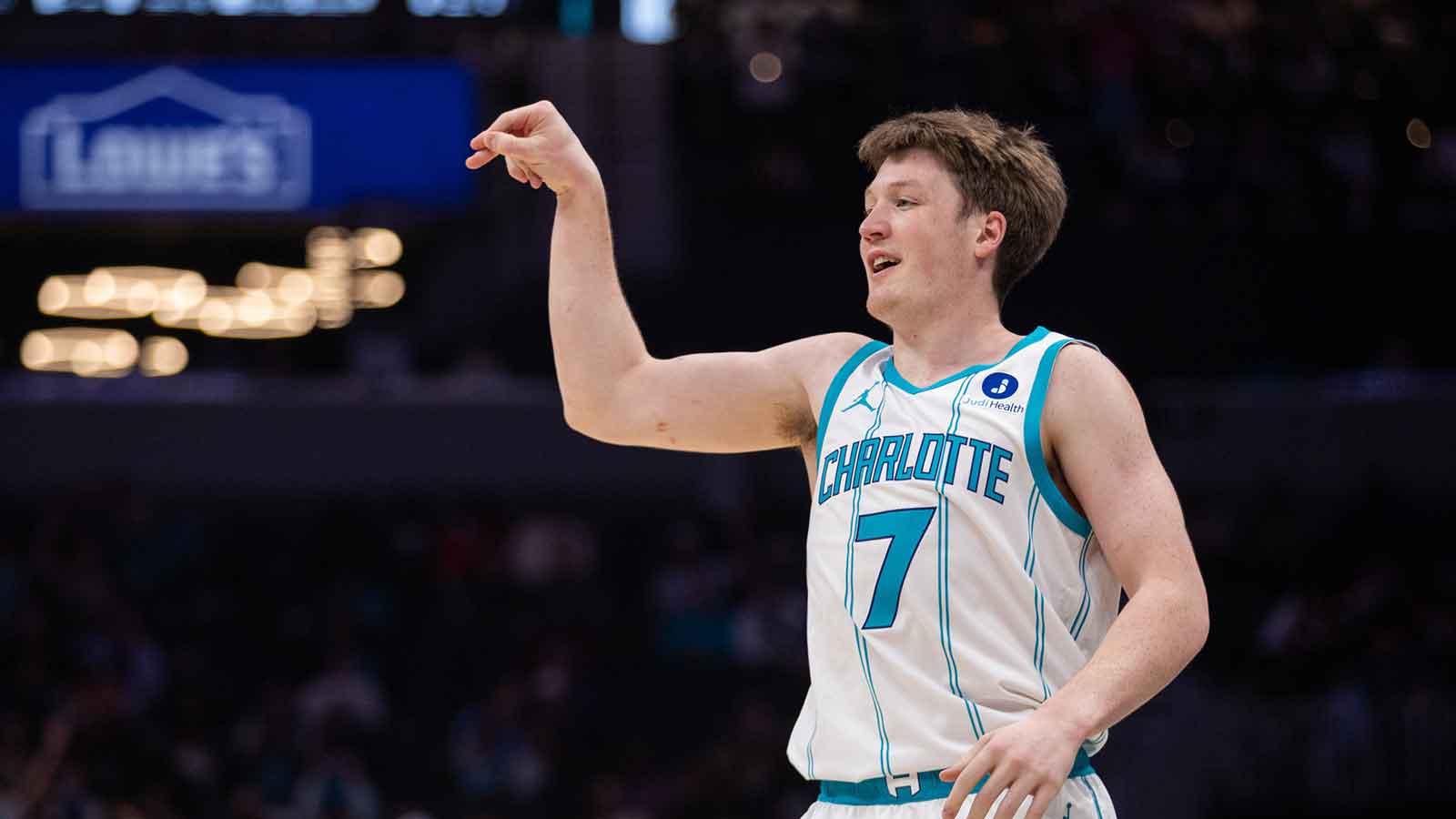 Hornets guard Kon Knueppel (7) celebrates a three point basket against the Portland Trail Blazers during the first quarter at Spectrum Center